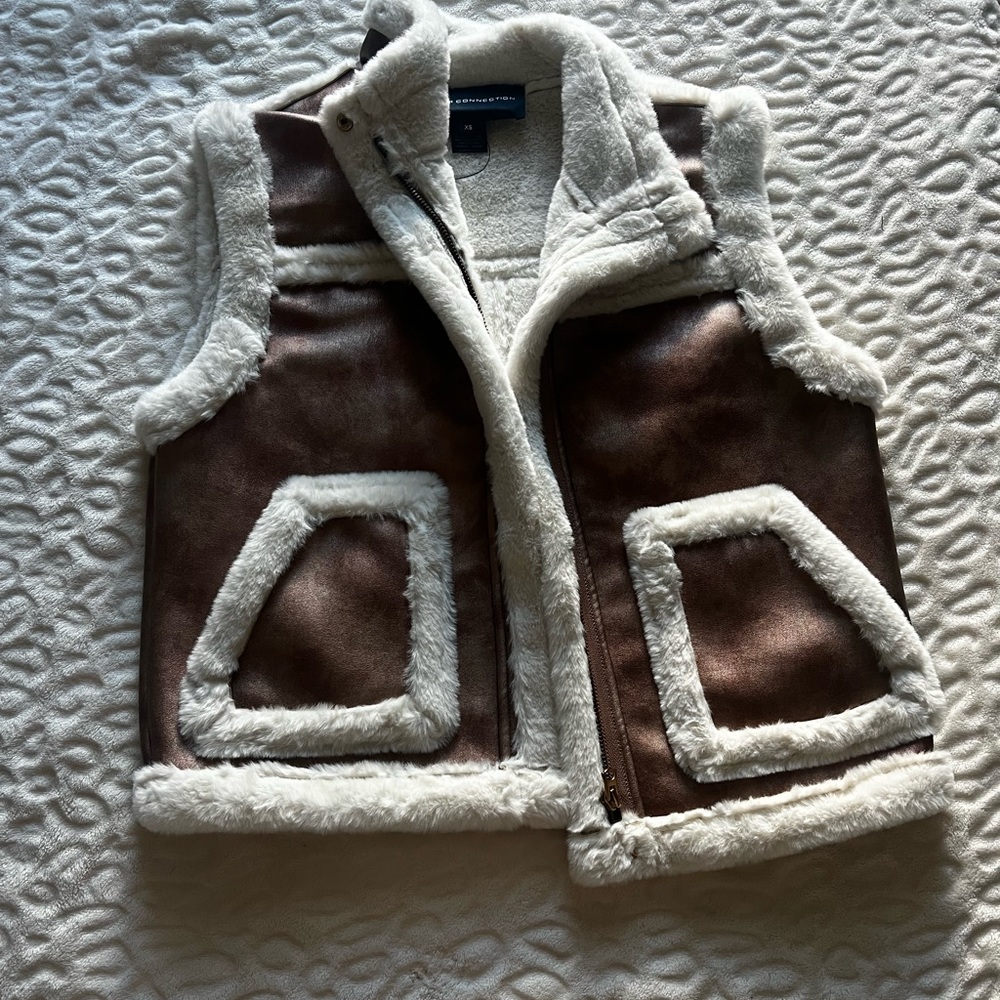 French connection vest with fur. Tags still on. Never worn.
